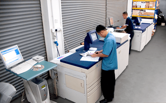 A view of the production line, which is hooked up to servers generating the content and controlling the print through a common standard called JDF